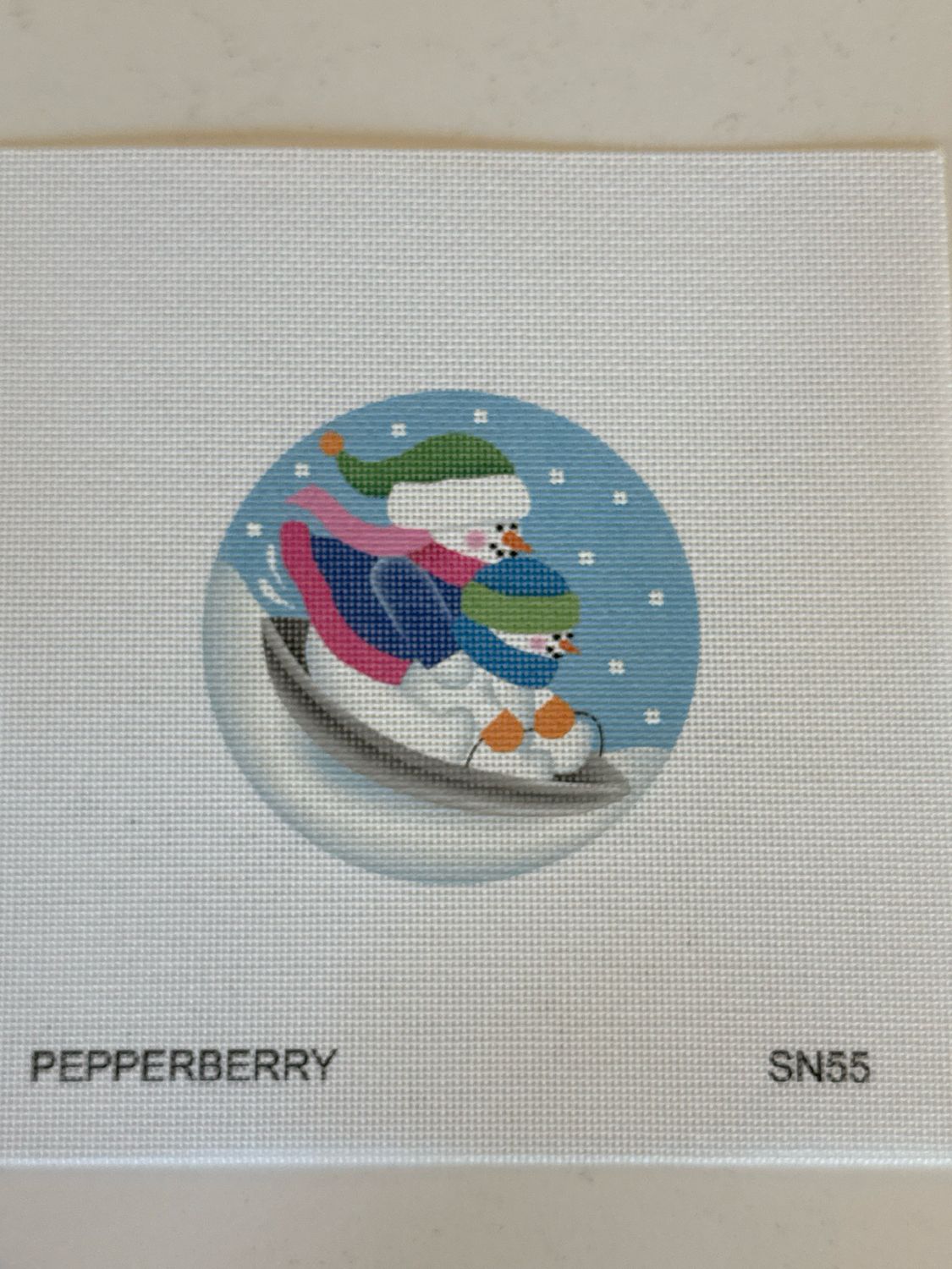Disc Sledding Snowmen