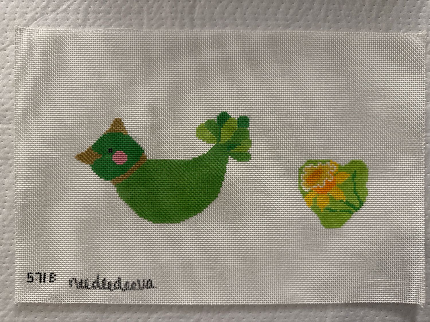 Green Bird with Daffodil