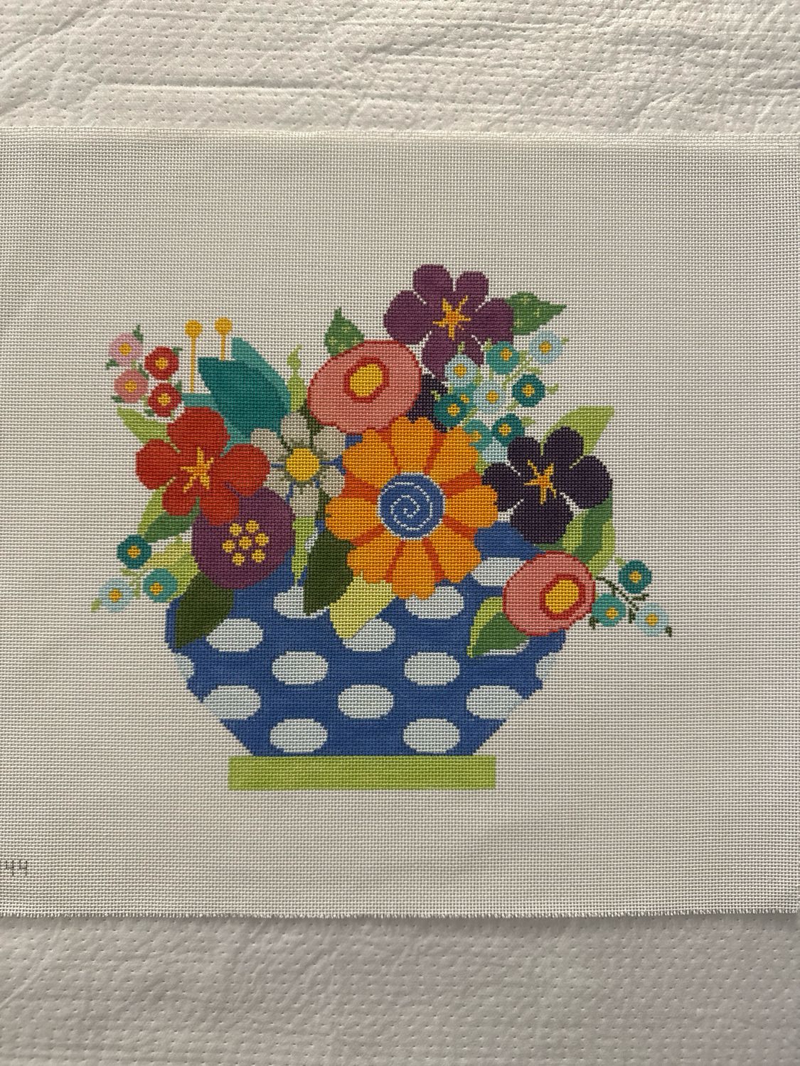 Flowers in Blue in Green Vase