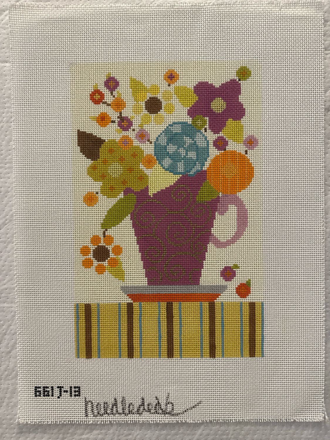 Flowers in Purple Tea Cup