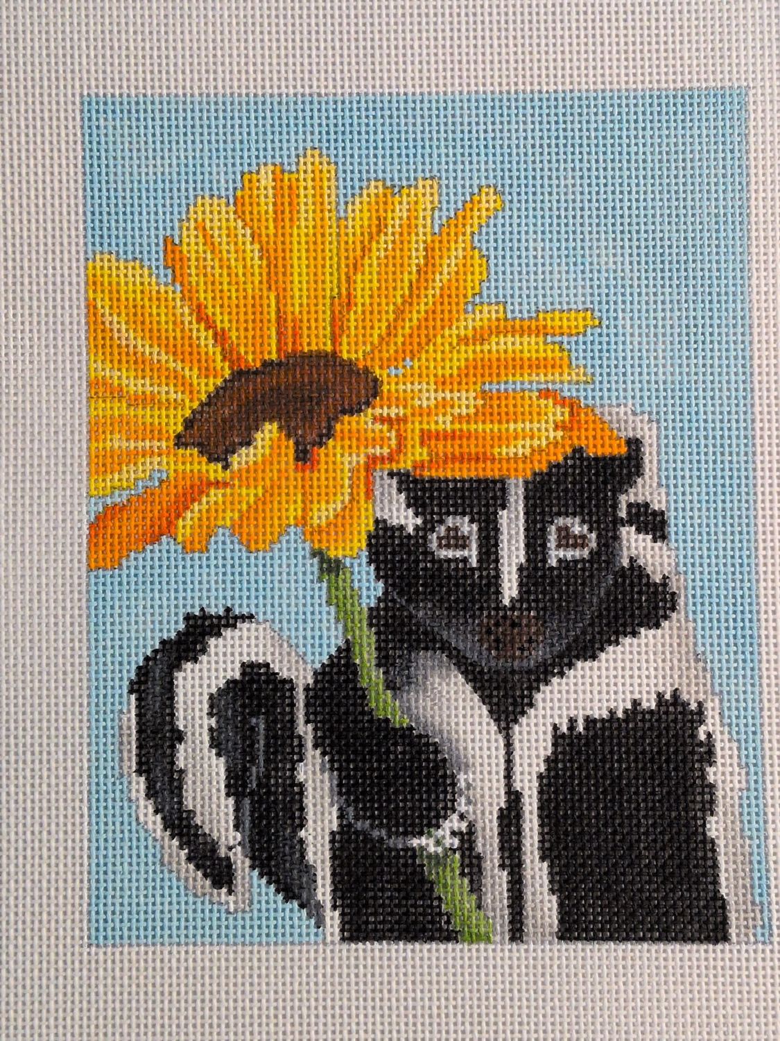 Skunk with Flower
