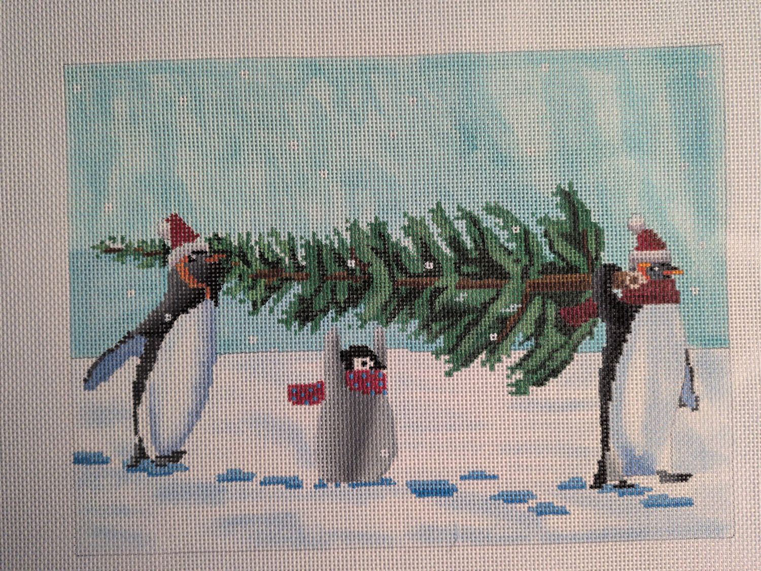 Penguins Bringing Home the Tree