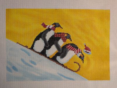 Penguins Sledding