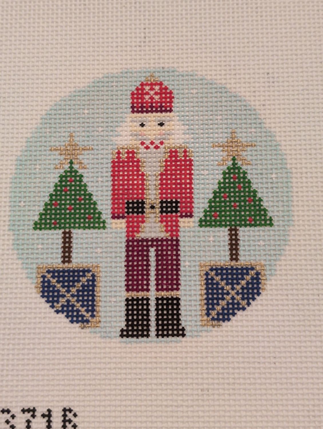 Blue Santa Nutcracker Round