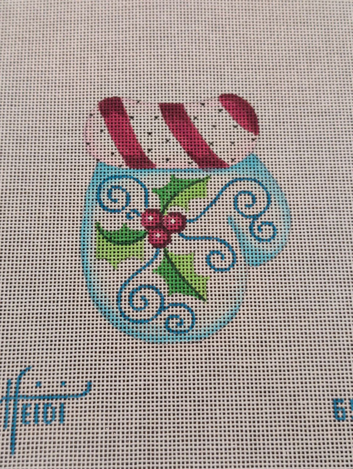 Holly Mitten