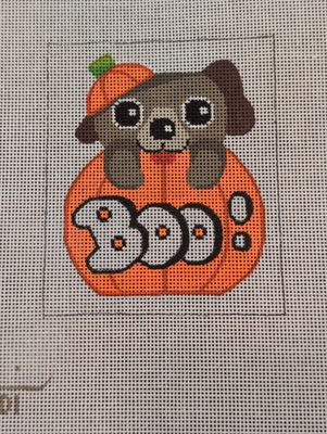 Dog in Pumpkin