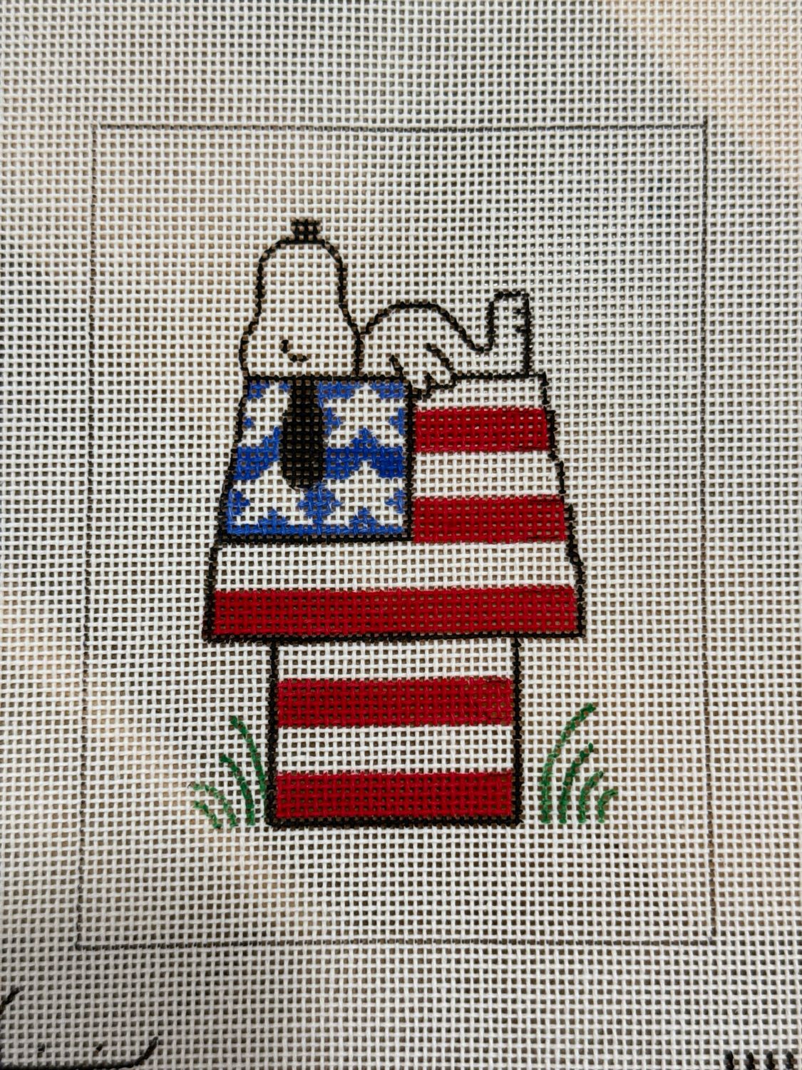 Snoopy on Flag Doghouse