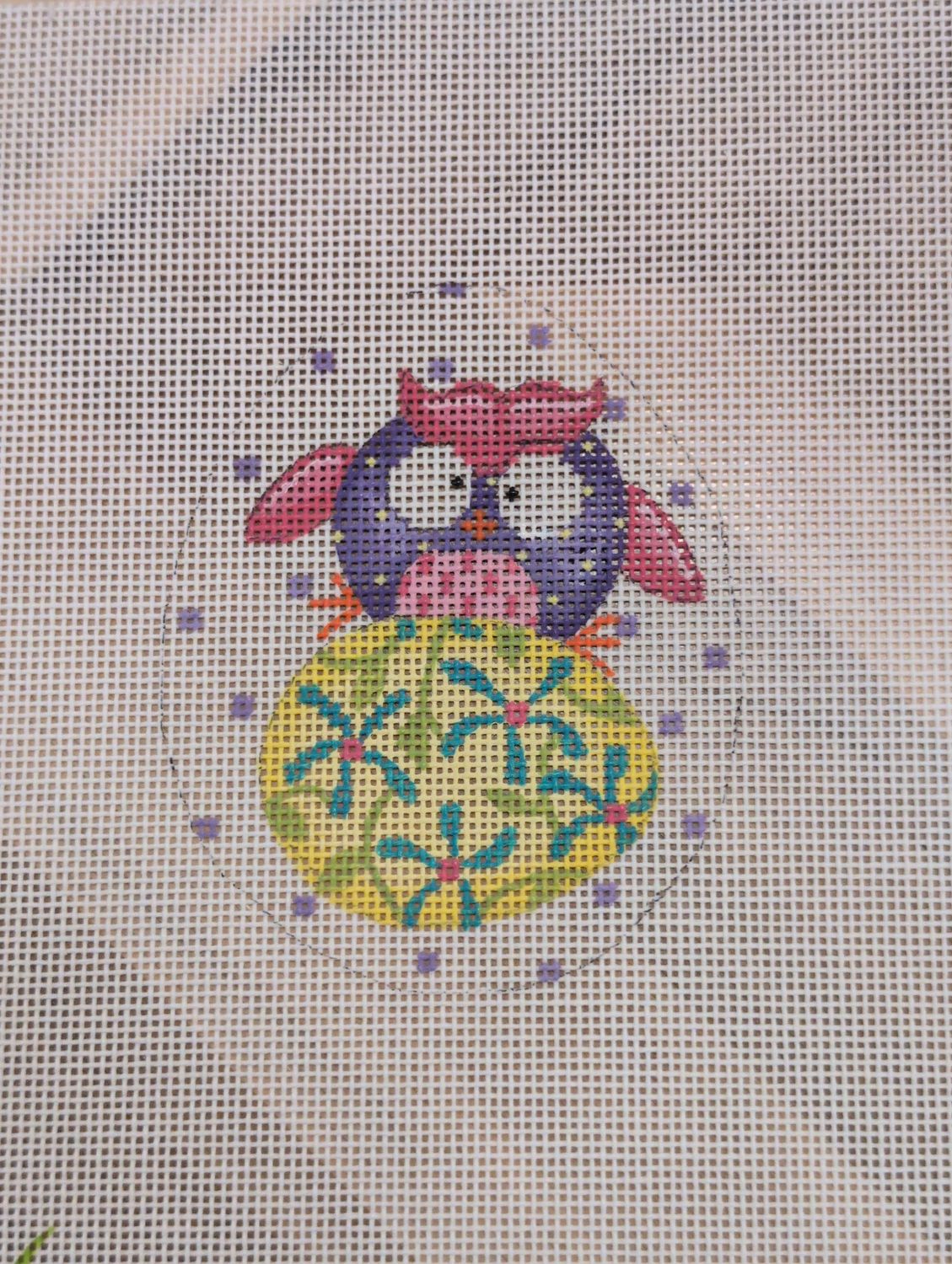 Owl on Egg