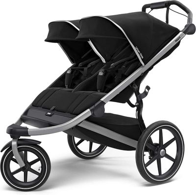 Side view of Thule double stroller with smooth ride for theme parks