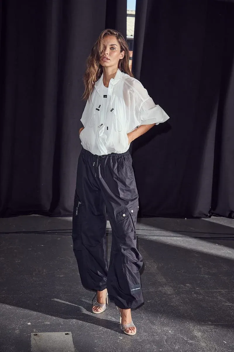 HAUTE L’AMITIÉ Air Zip Pant Black