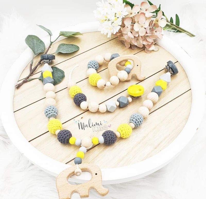 Kinderwagenkette/Schnullerkette/Beißring Set gelb/grau
