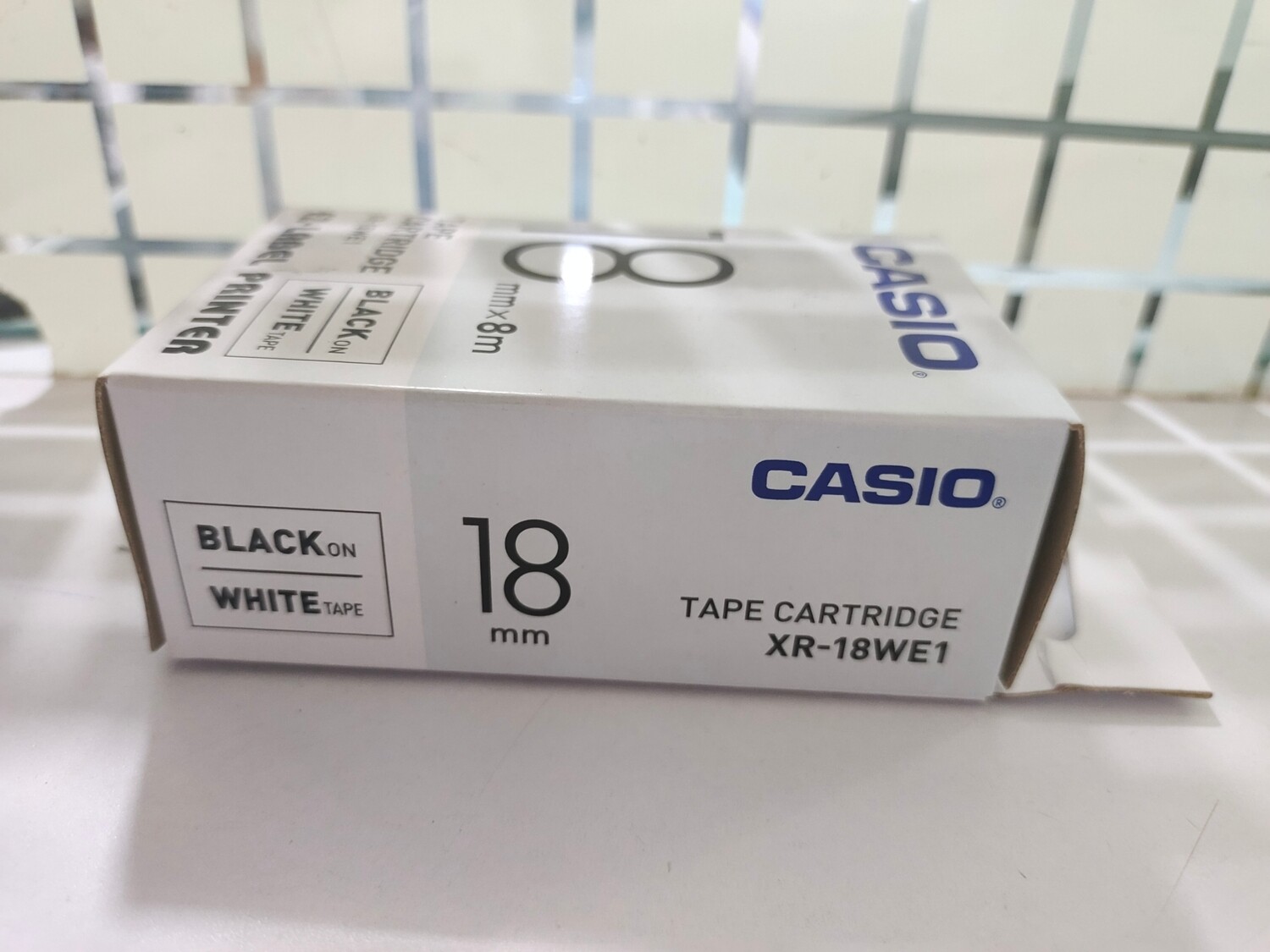 Casio XR-18WE1 Black on White 18mm Label Tape Casio XR-18WE1 Black on White 18mm Label Tape