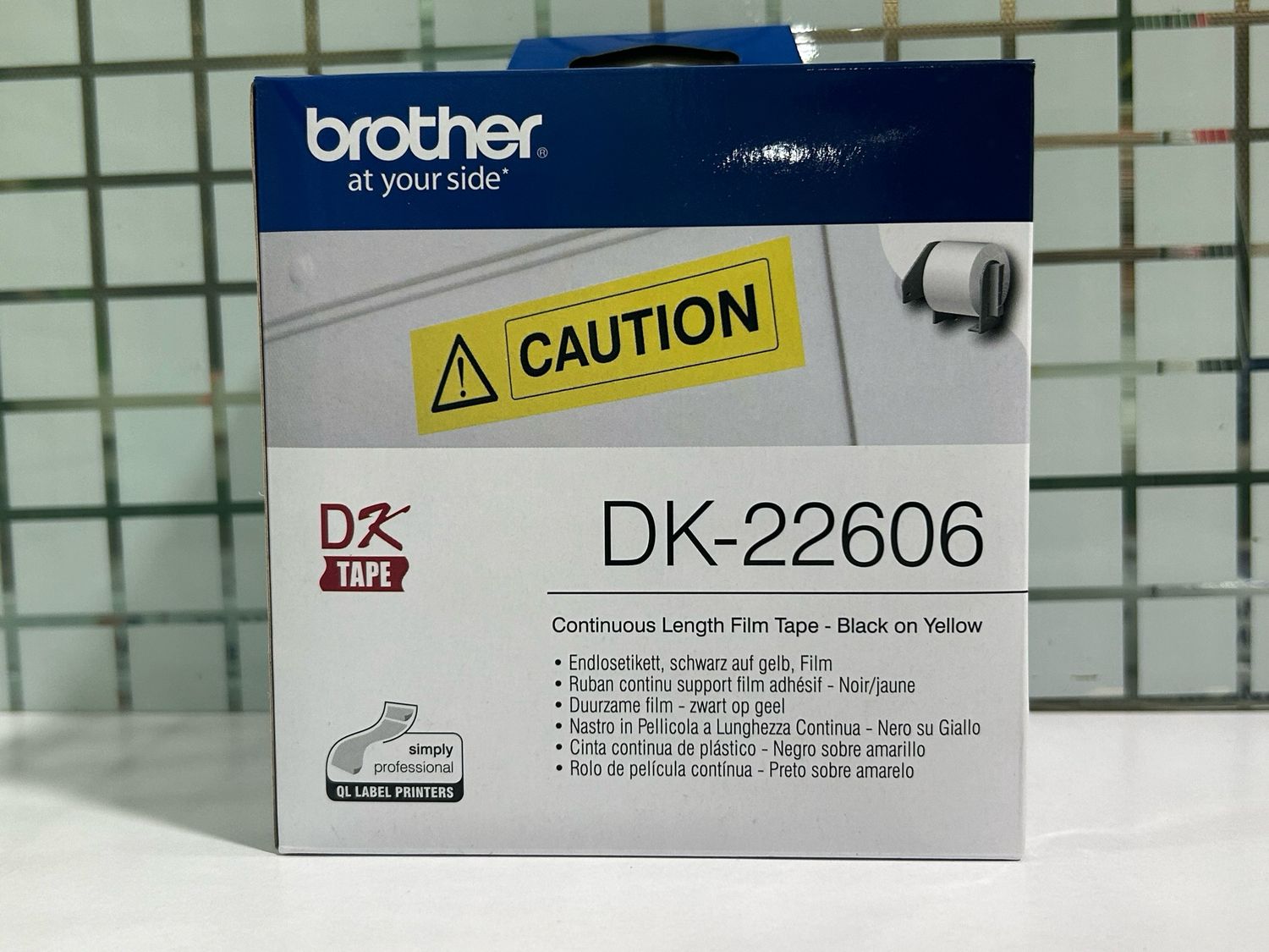 Brother DK22606 Continuous Length Film Tape, Black on Yellow