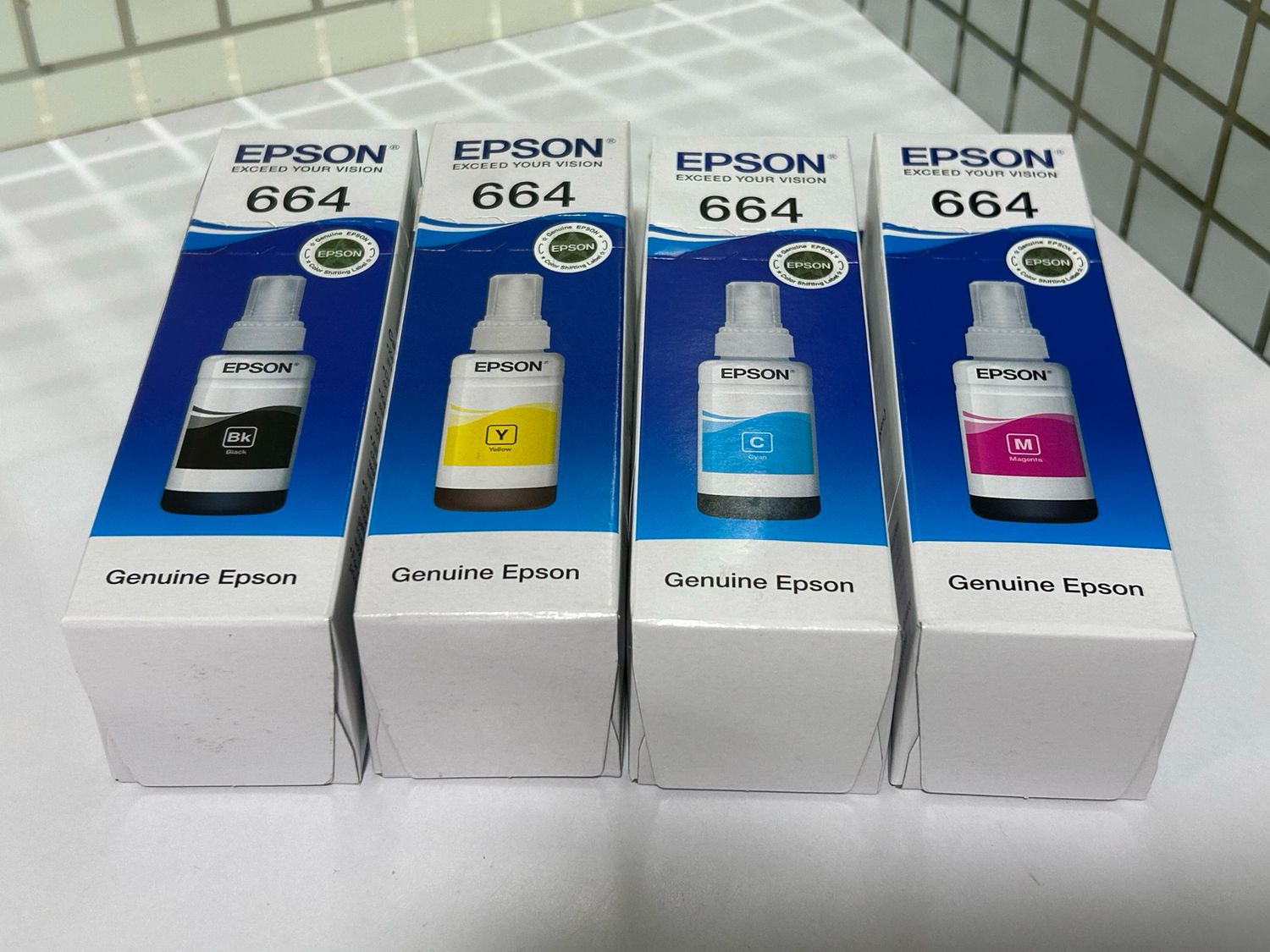 Epson 664 set of 4 bottle (L550, L555, L565, L605, L655, L1300) Epson 664 set of 4 bottle (L550, L555, L565, L605, L655, L1300)