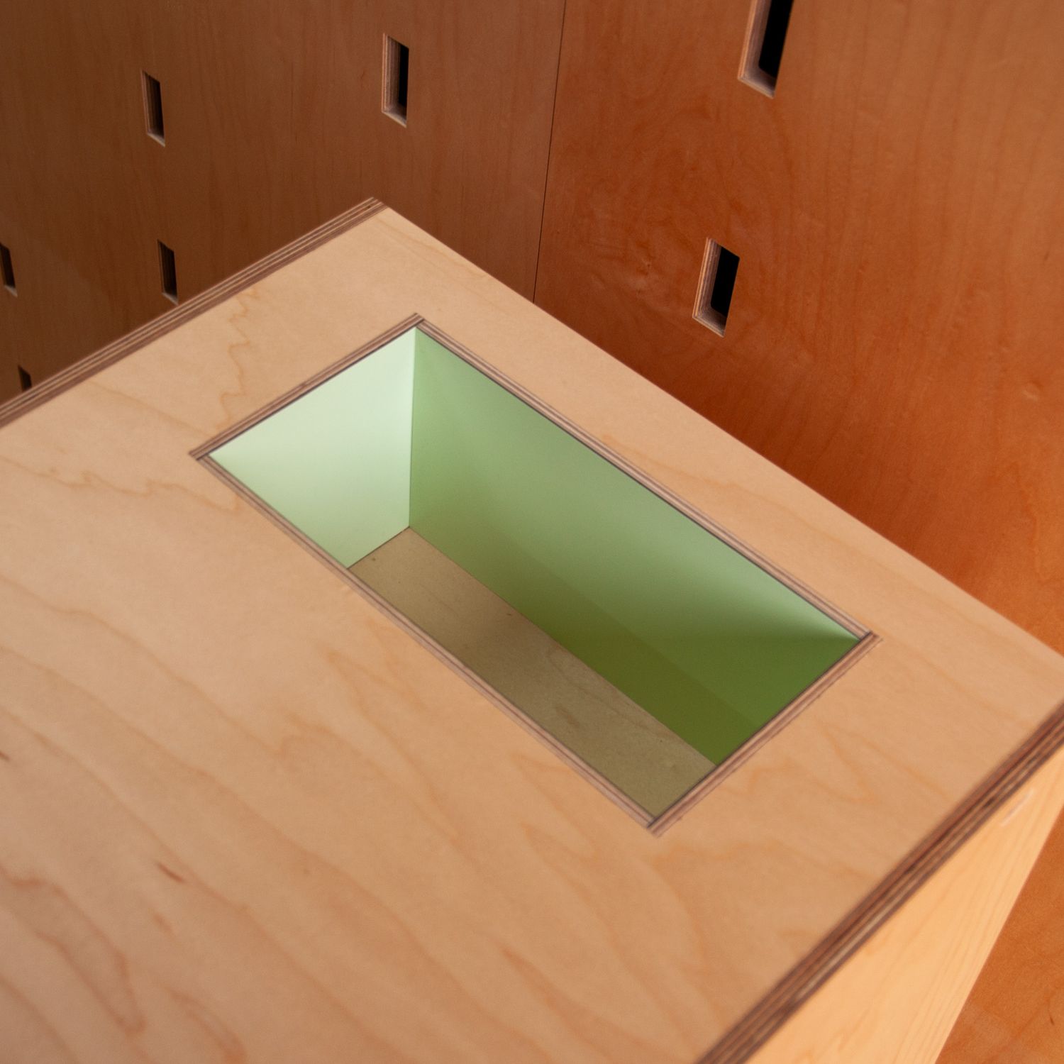 4 drawer cabinet with a green cubby