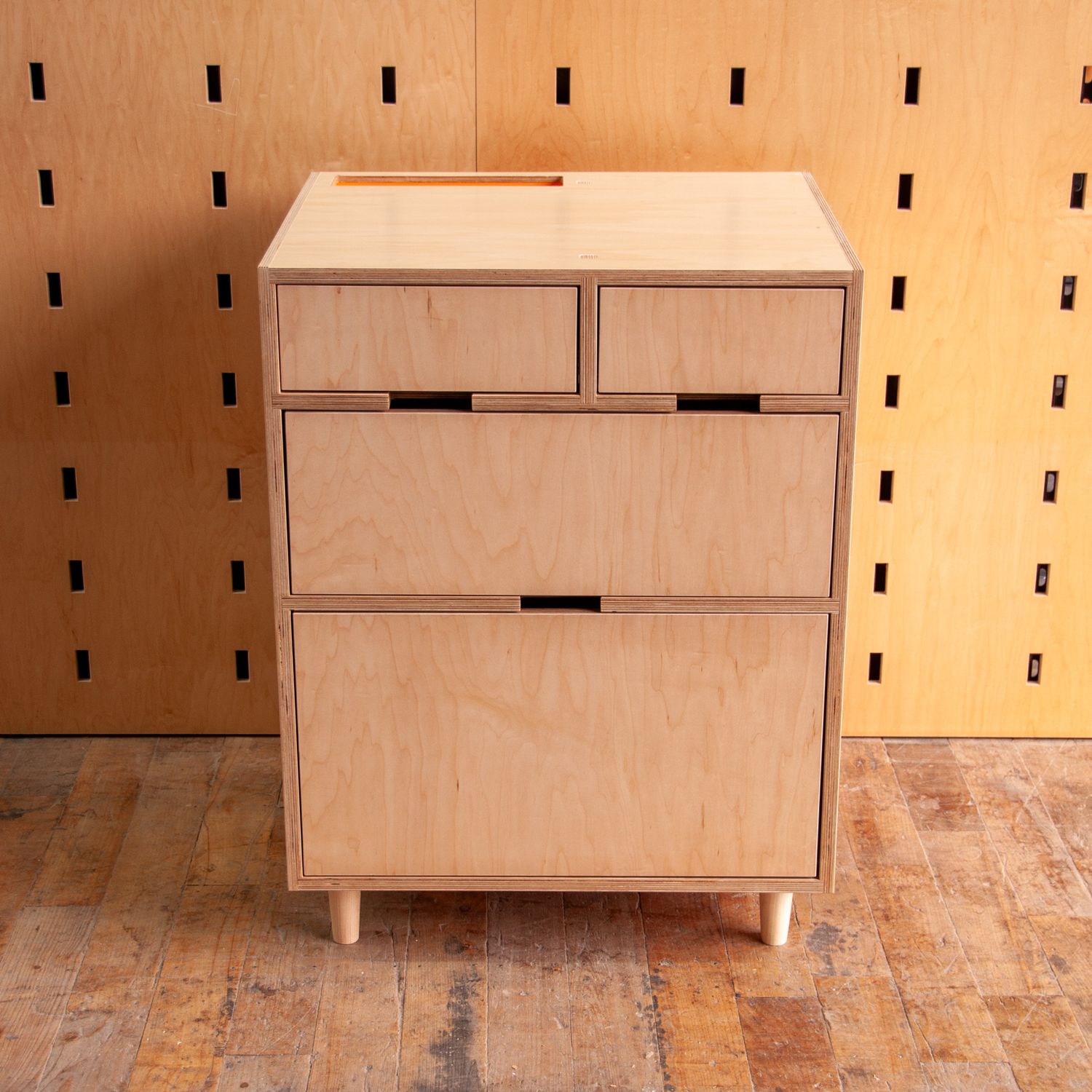 2 drawers over 2 drawers with an orange cubby