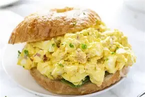 Dinner Tray-egg salad on croissant with cucumber Salad