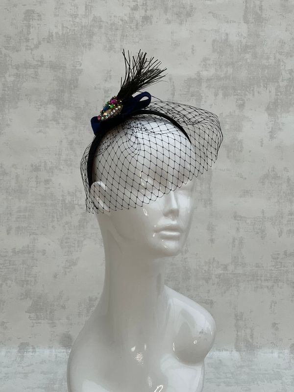 Headband with peacock feather