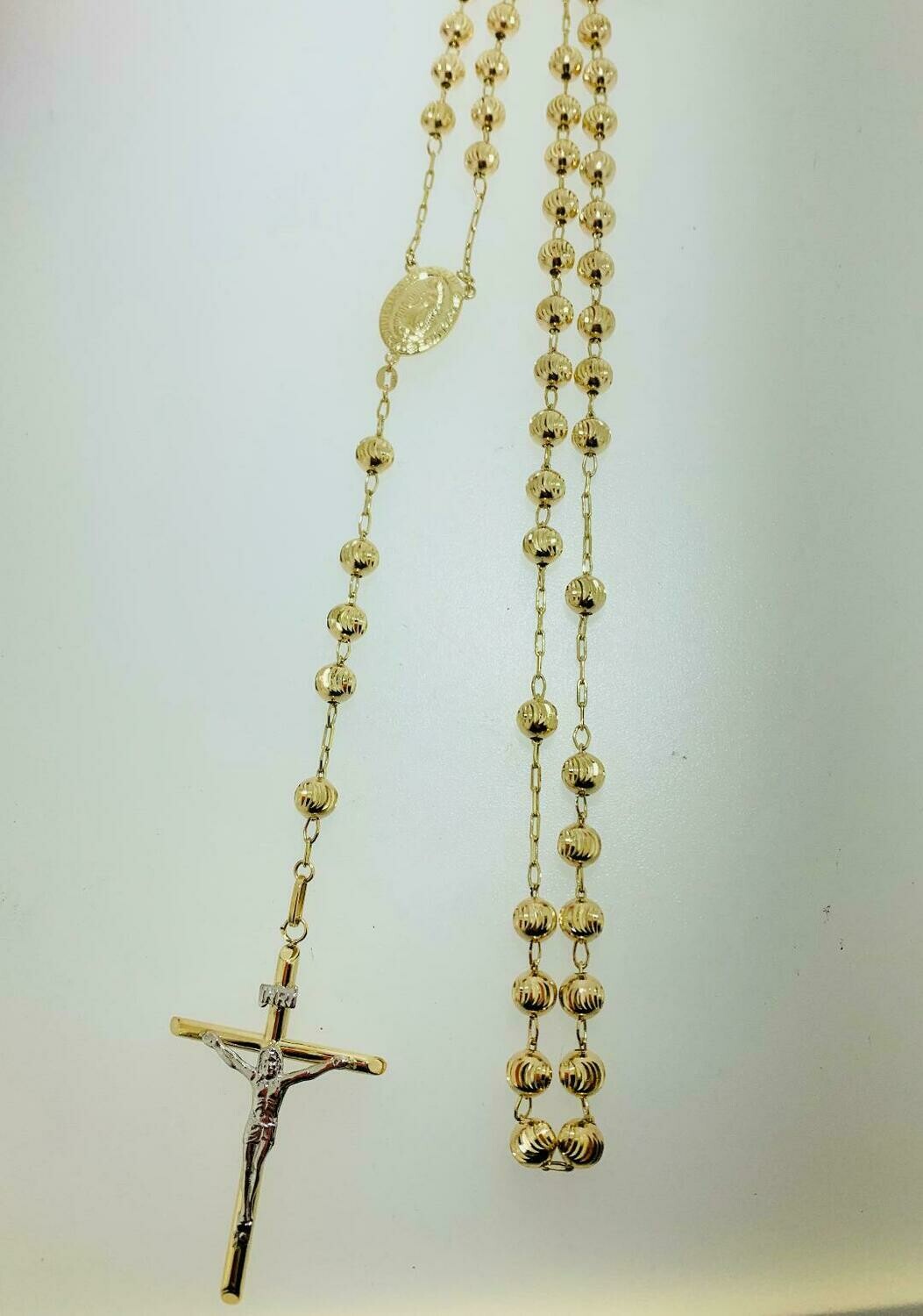 9CT GOLD ROSARY BEADS.