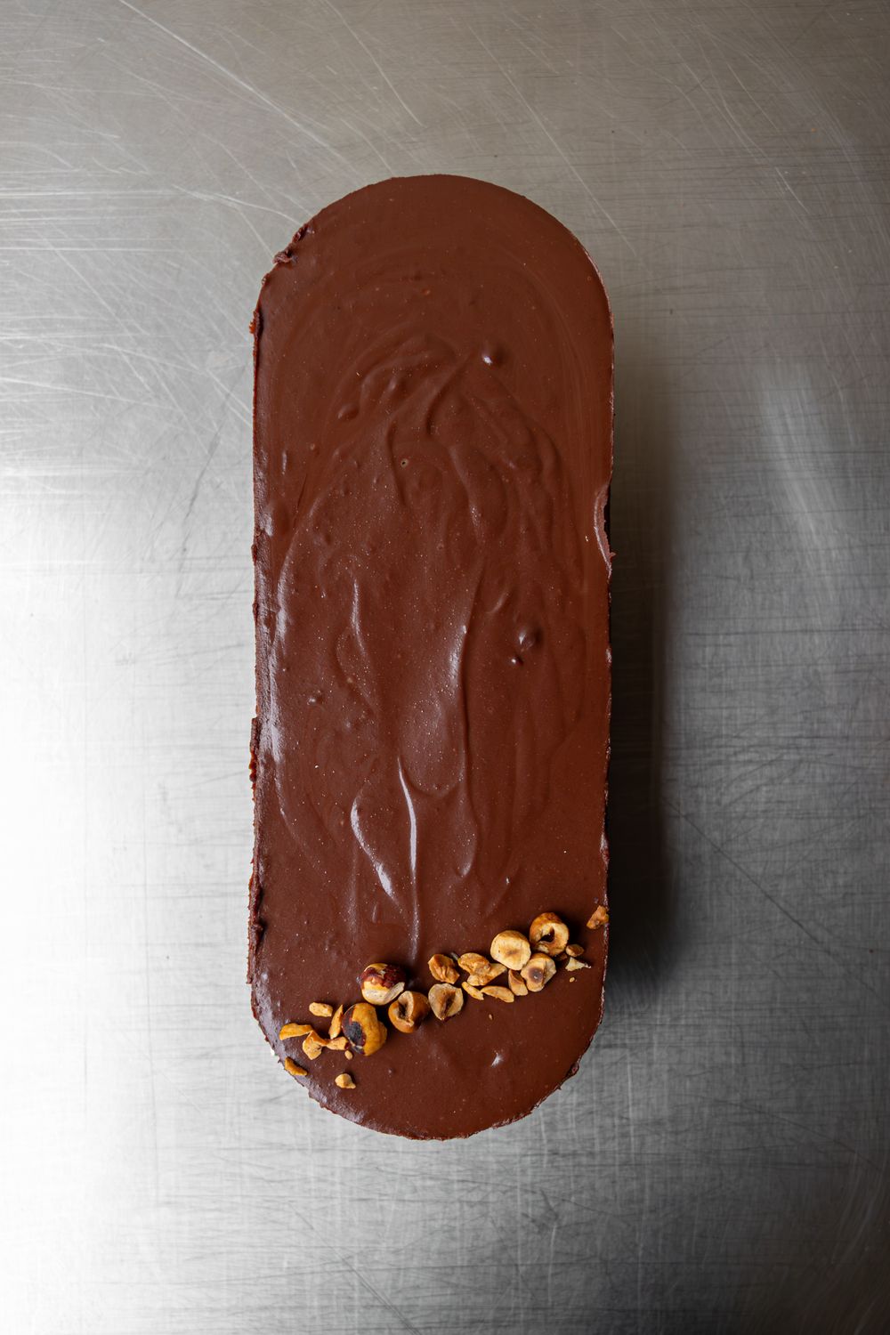 Dessert Xoco (6-8 pers) : crémeux au chocolat Mayan Red 62% de chez @Xoco sur un praliné feuillantine croustillant