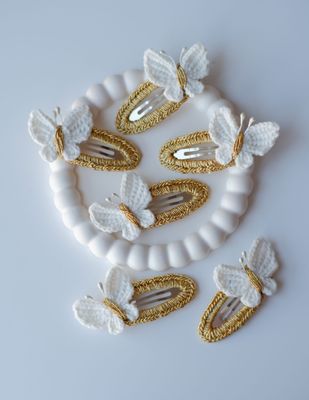Cream magic butterfly clips