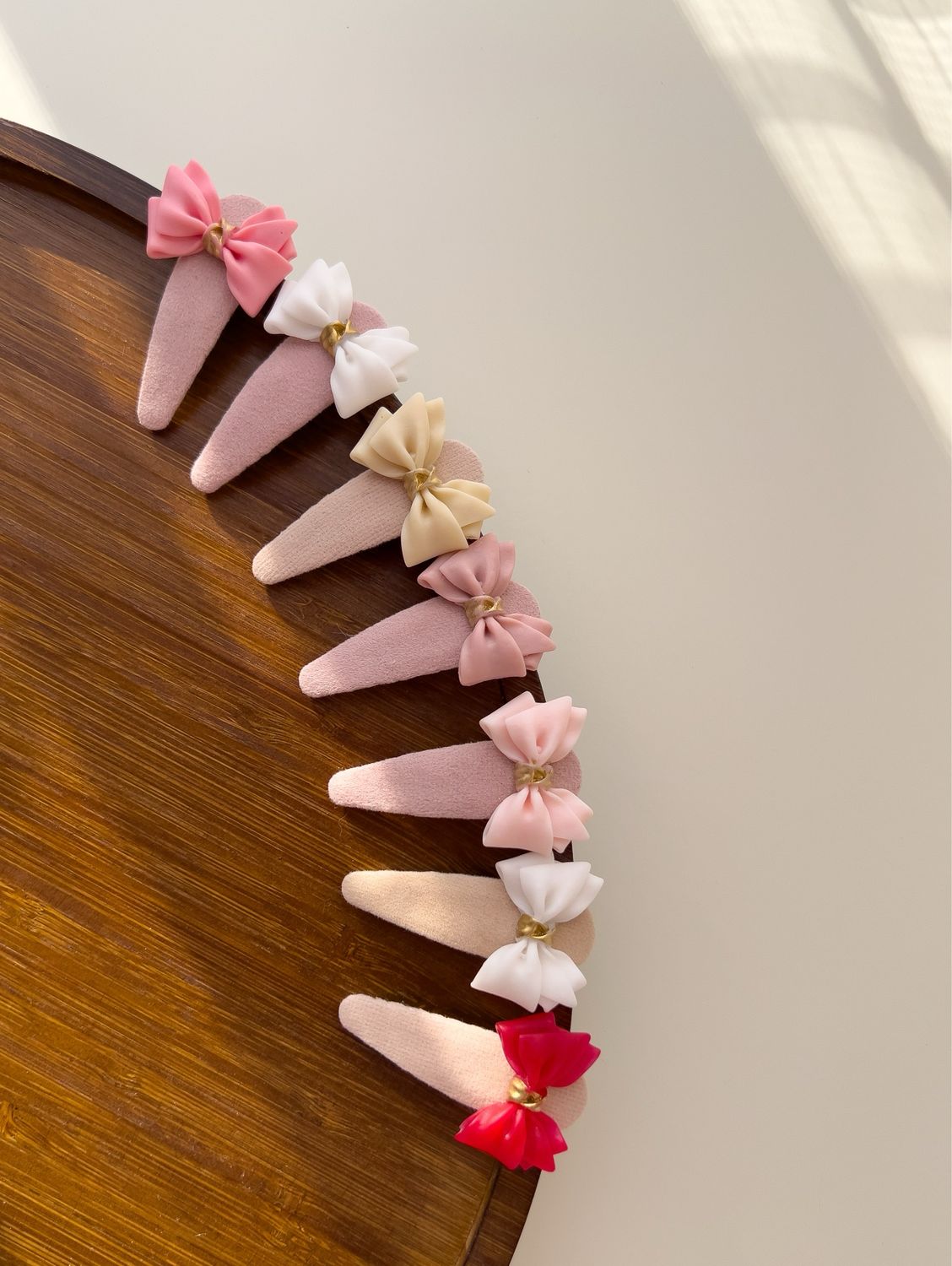 Clame – ​Mini Bow Touch