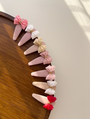 Clame – ​Mini Bow Touch
