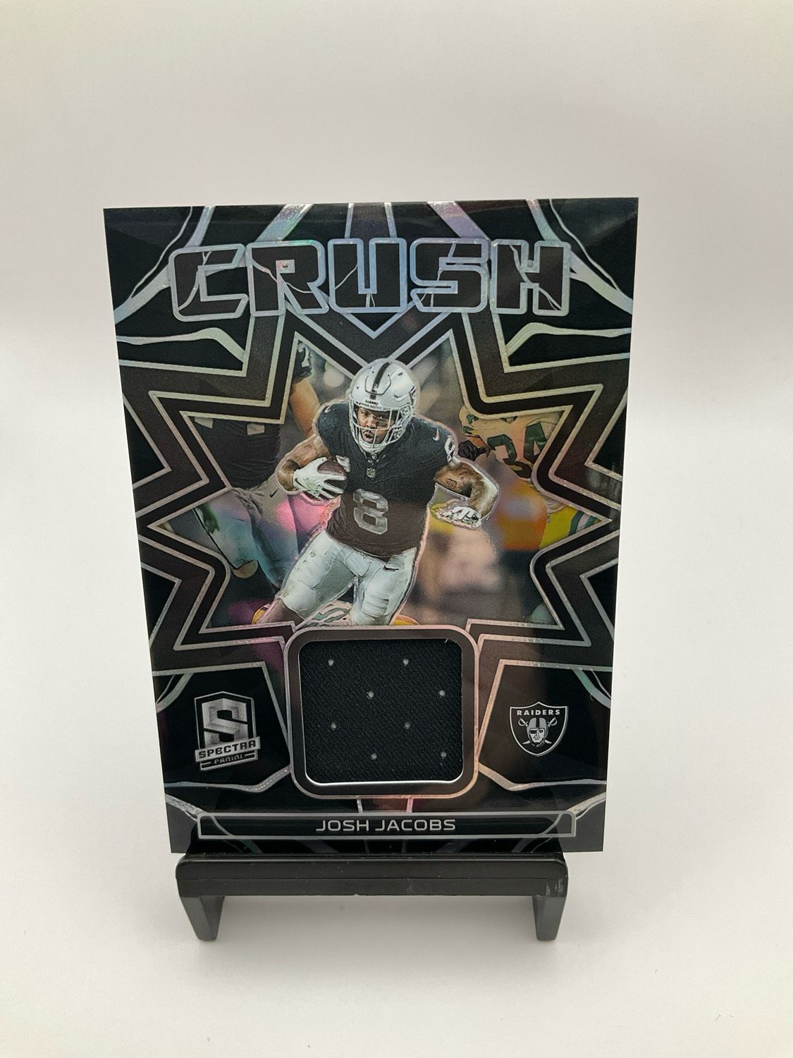 2023 SPECTRA JOSH JACOBS CRUSH PATCH BLACK 74/99