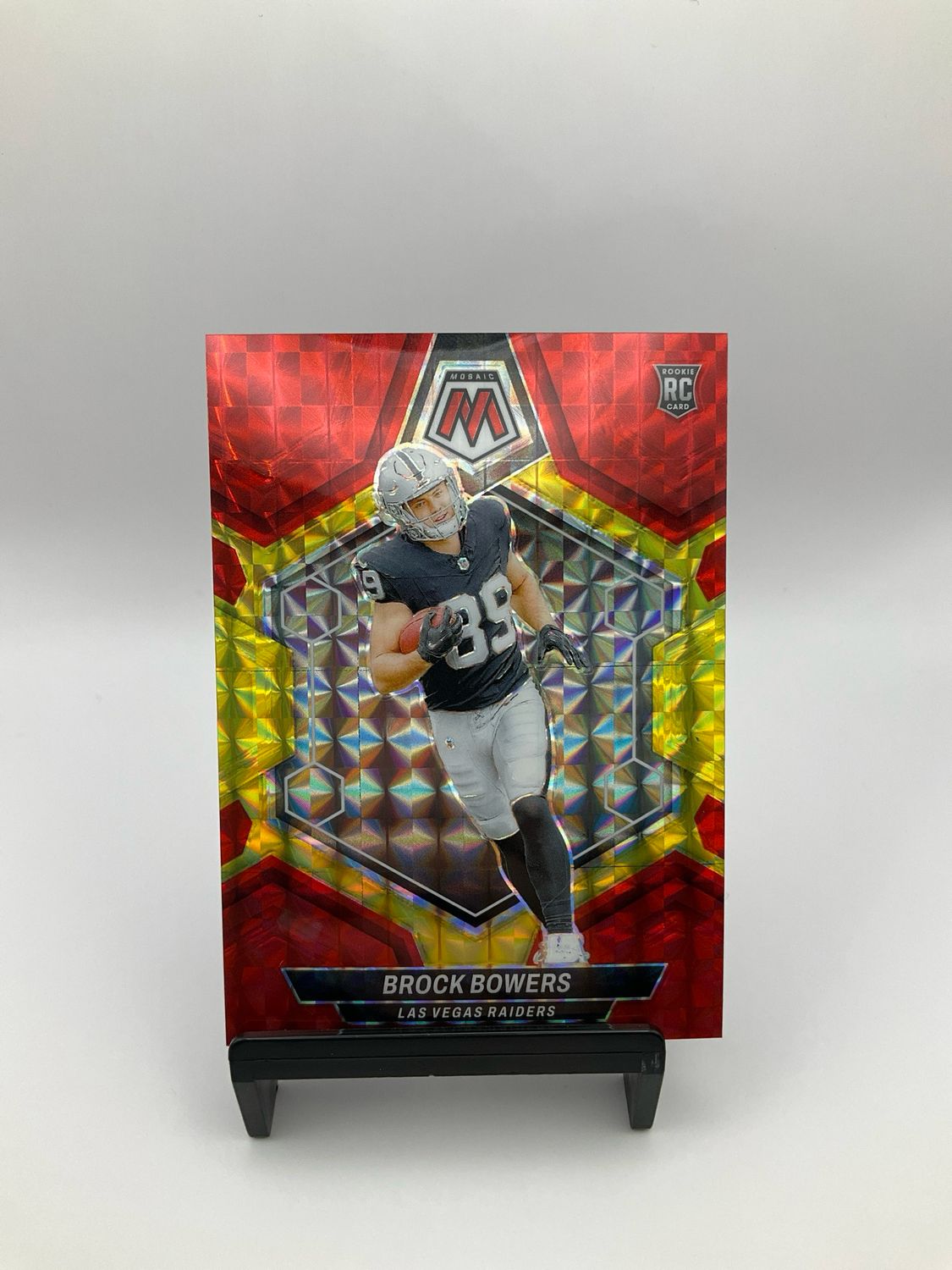 2024 Panini Mosaic Fusion Red and Yellow Choice Mosaic 52/80 Brock Bowers #313