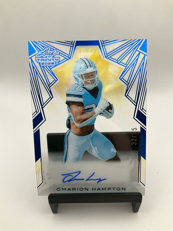 2025 TRINITY OMARION HAMPTON AUTO BLUE ACETATE 32/35