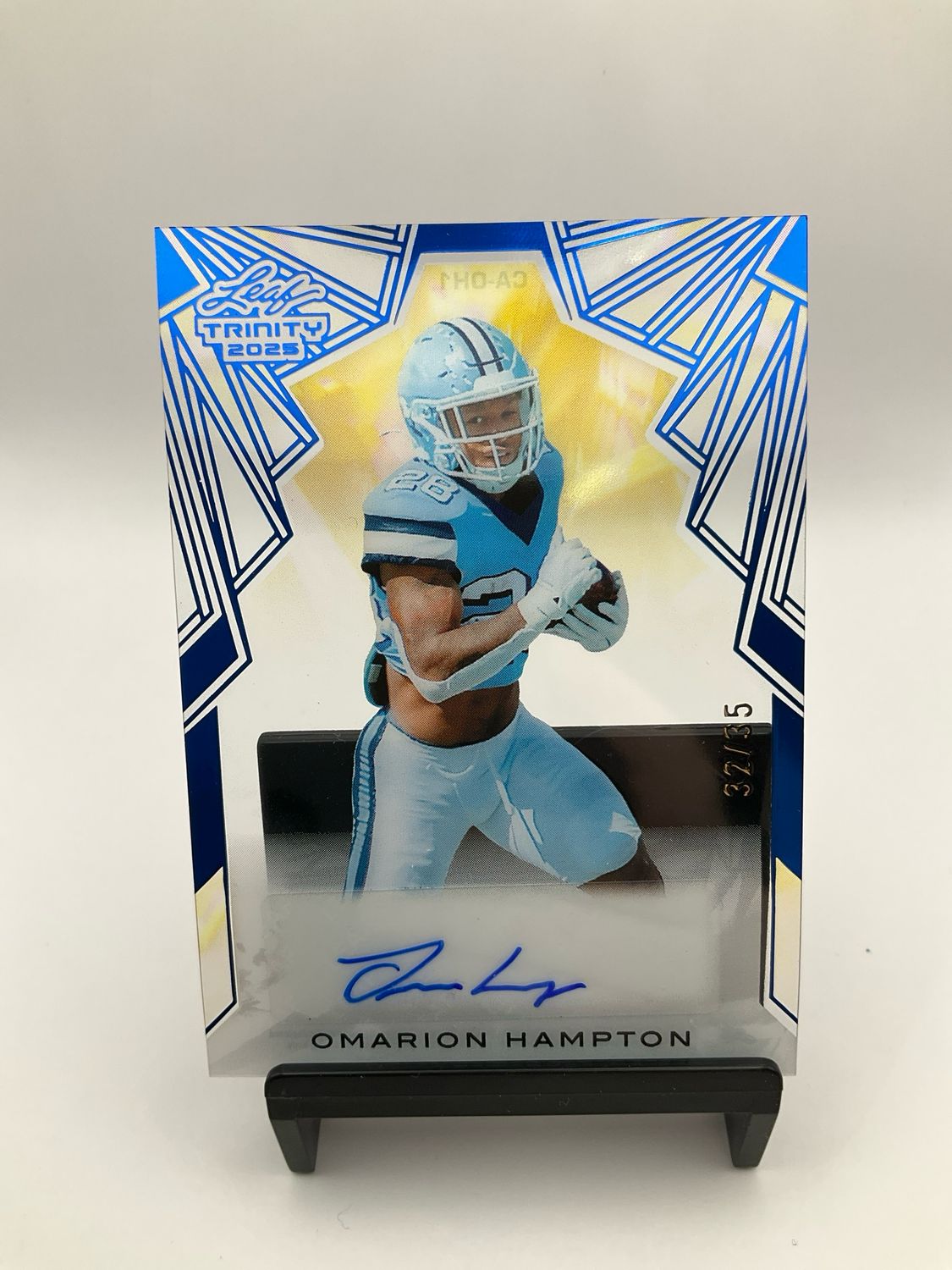 2025 TRINITY OMARION HAMPTON AUTO BLUE ACETATE 32/35