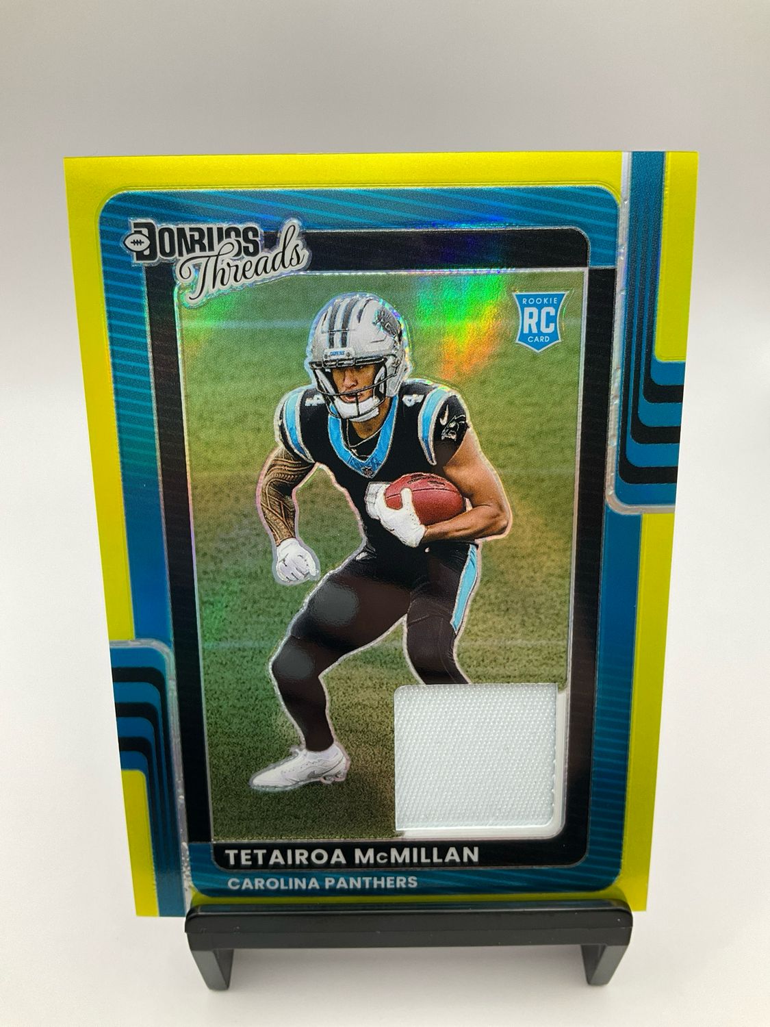2025 OPTIC TETAIROA MCMILLAN DONRUSS THREADS YELLOW /99 DTBH-TMN