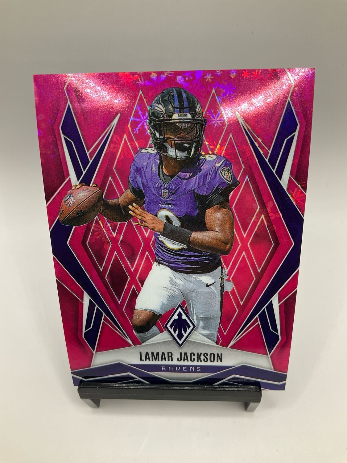 2025 Panini Phoenix Lamar Jackson #144 Pink Winter 277/299