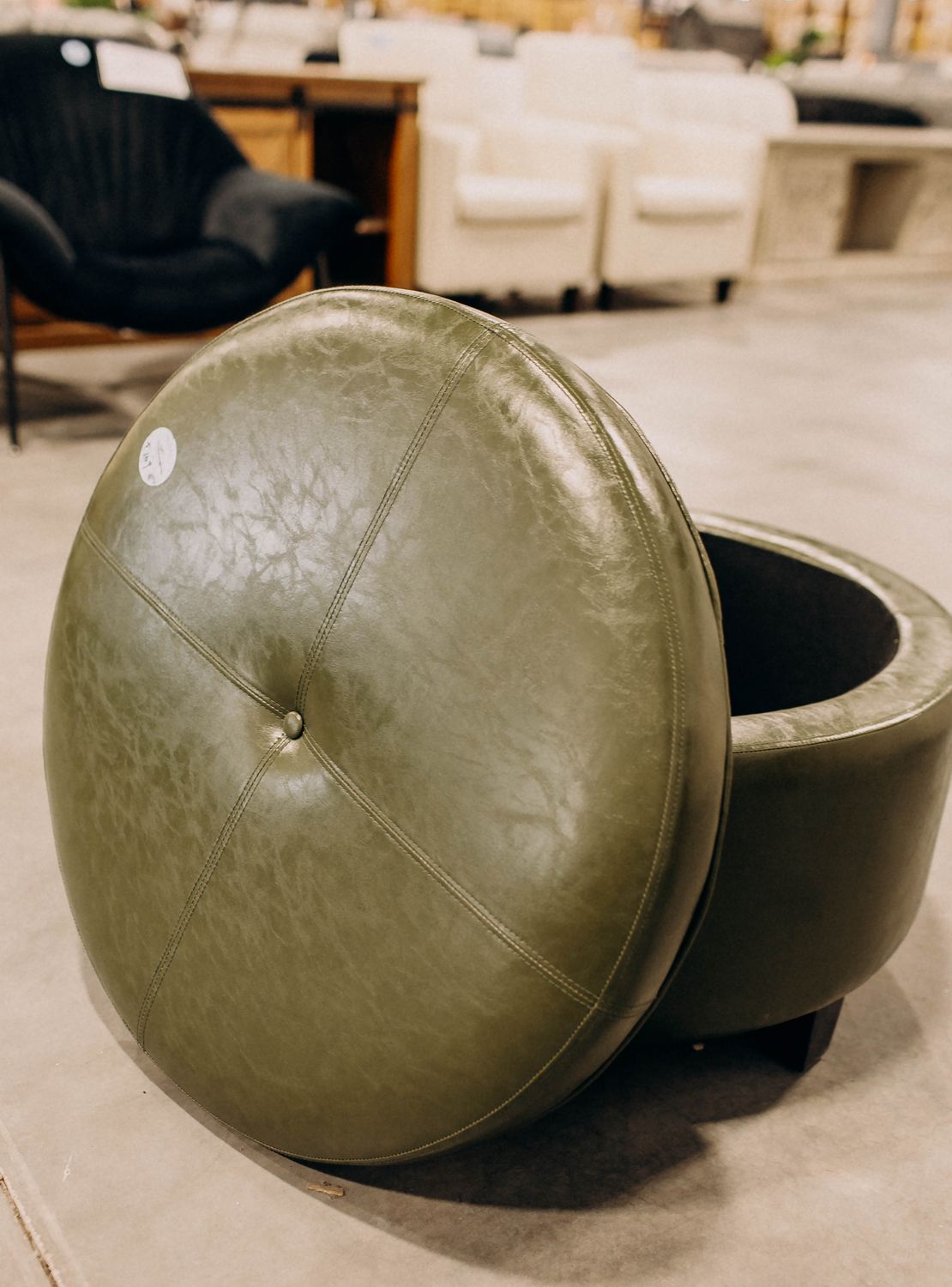 Green faux leather storage ottoman