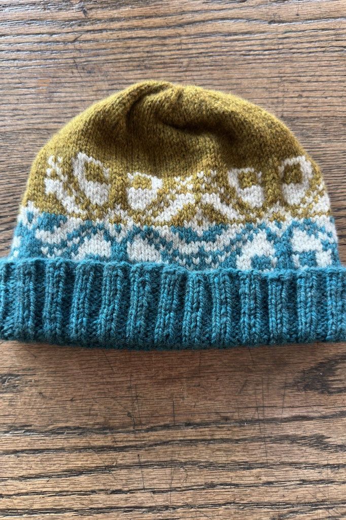 Olive Peacock White Knitted Hat