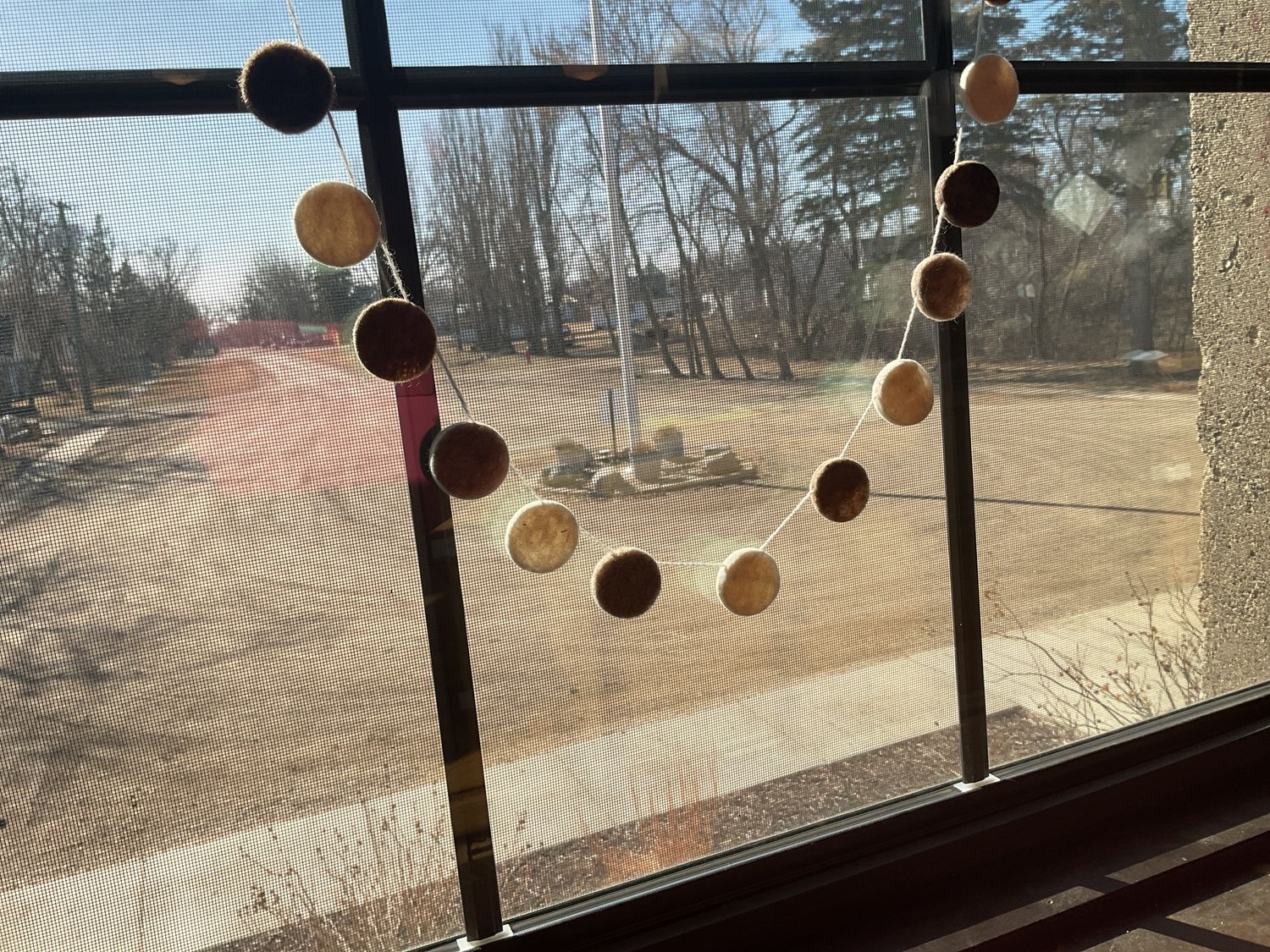 Felted small disks for garland