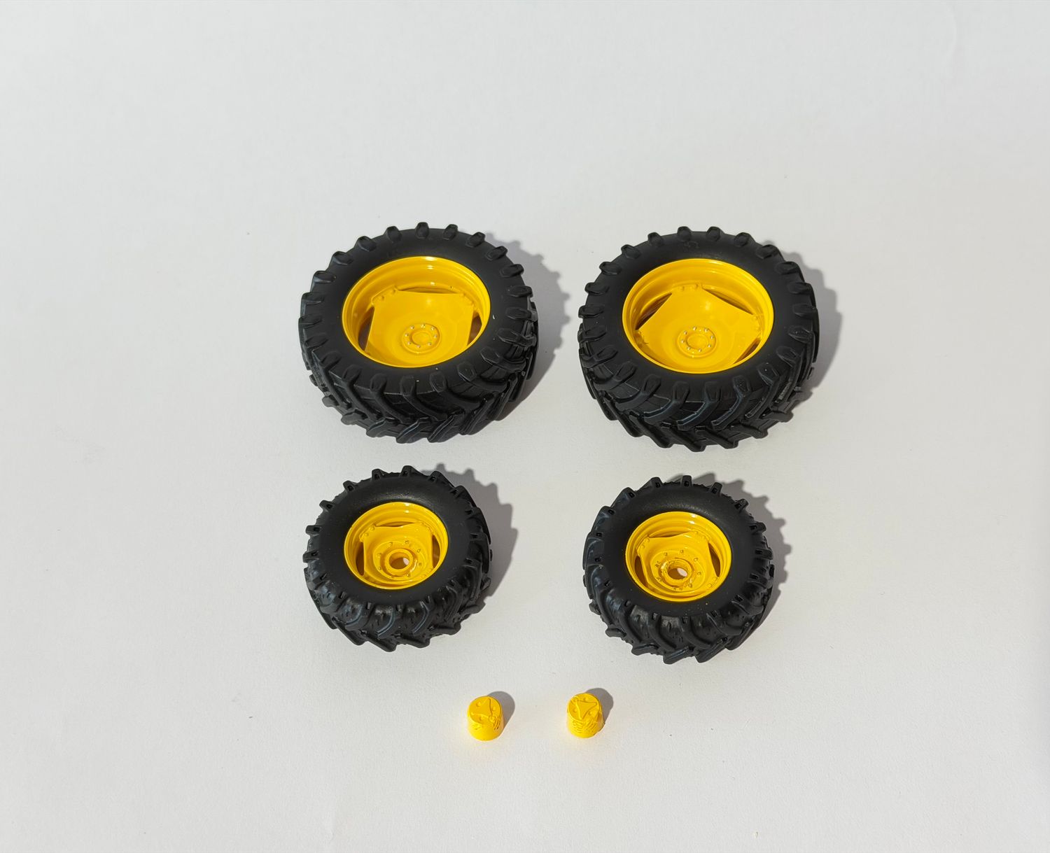 Bandenset John Deere 6100 incl naafkapjes