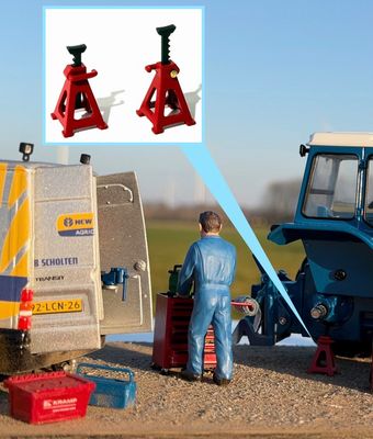 2x in hoogte verstelbare as steunen rood.