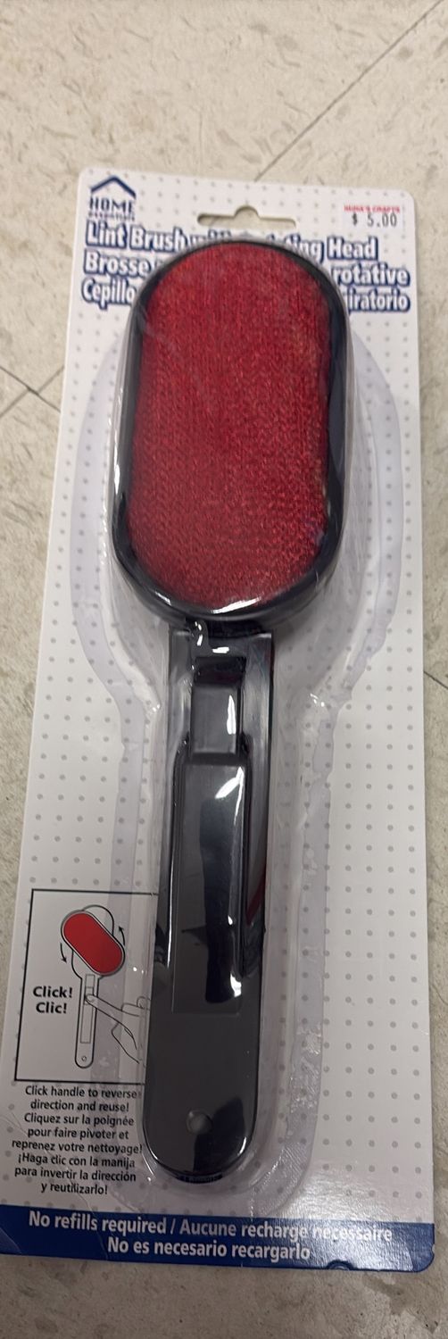 Lint brush with rotating head