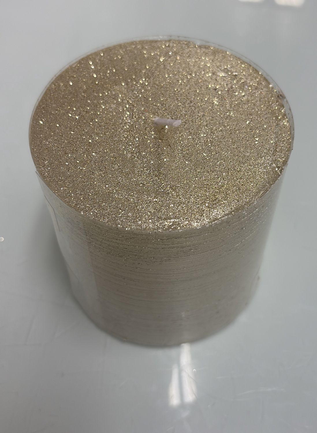 Golden glitter candle