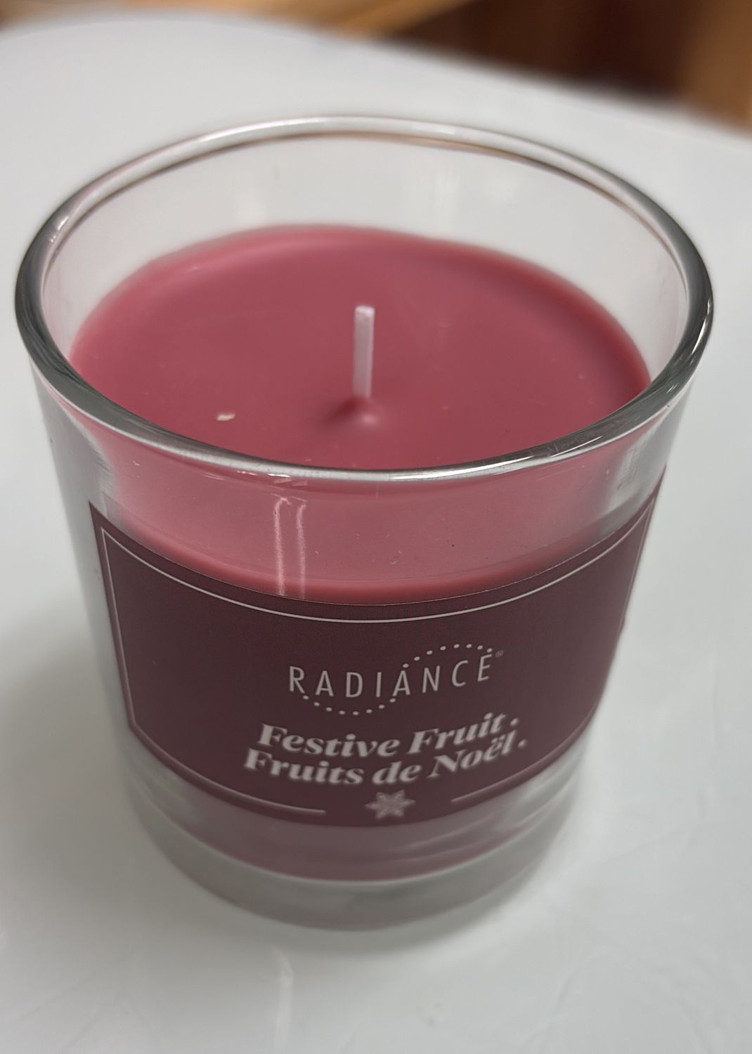 Radiance festive fruit scented glass candle