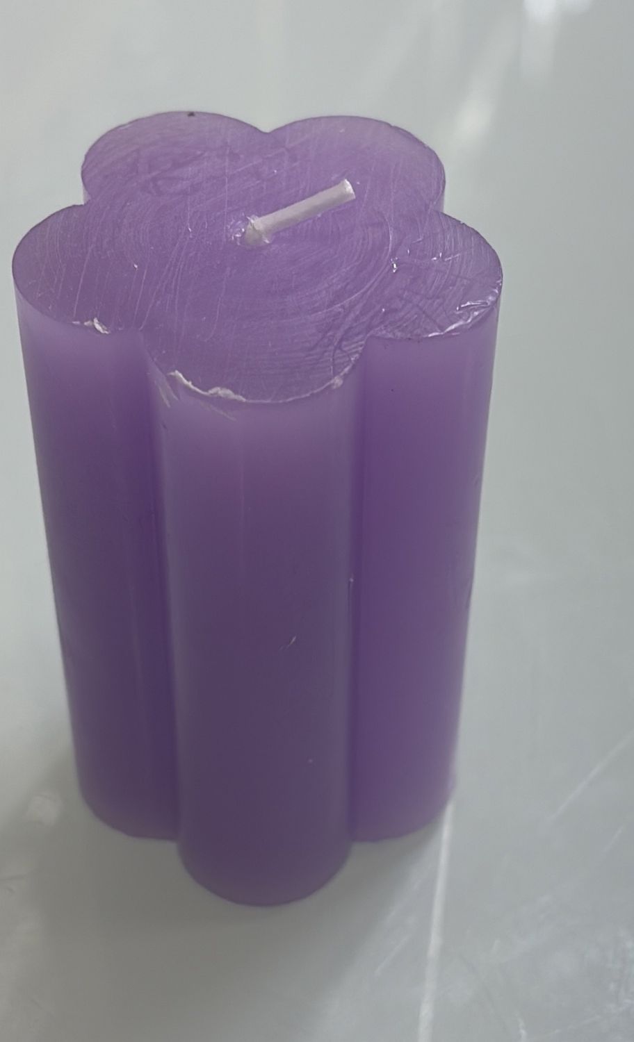 Purple flower shape candle