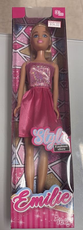 Emily playing doll