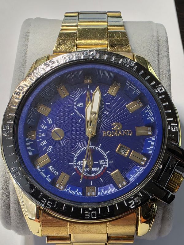 Romand gents watch with blue face and gold indices pre owned