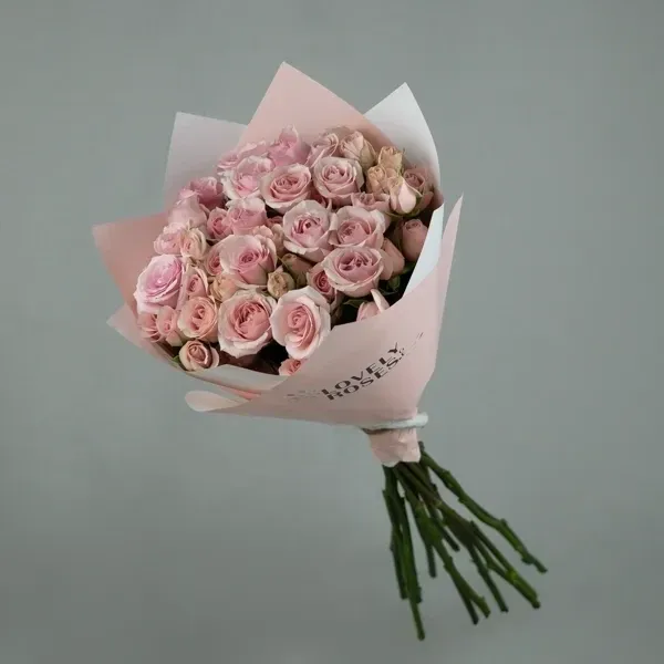 The bouquet is made with pink spray roses Height of the bouquet - is 50 cm.