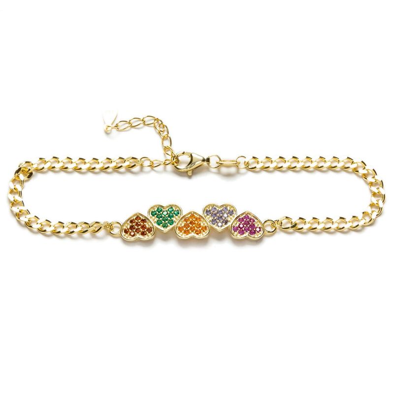 Pulsera en Plata de Ley y Baño Oro con Circonitas de Colores. CORAZONES.