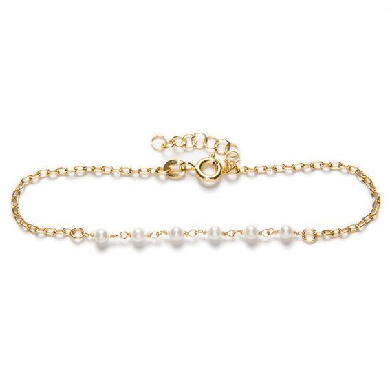 Pulsera en plata de ley bañada en oro  y perlas.