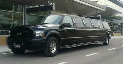 Lake Louise, Alberta to Calgary or Calgary Airport YYC (Flat Rate Transfer) - 14 Passenger Stretch SUV Limousine