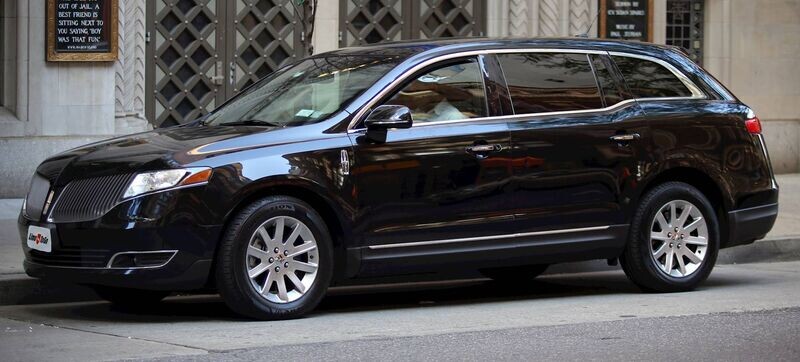 Banff, Alberta to Calgary or Calgary Airport YYC (Flat Rate Transfer) - 3 Passenger Luxury Black Sedan