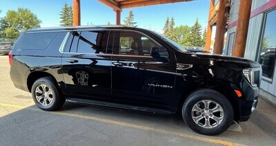Canmore, Alberta to Calgary or Calgary Airport YYC (Flat Rate Transfer) - 7 Passenger Luxury Full Size SUV
